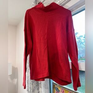Red turtleneck sweater